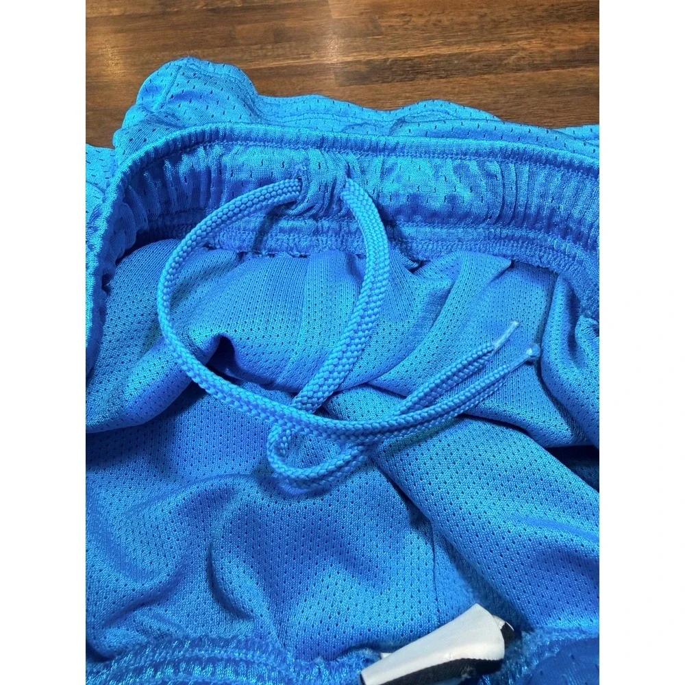 Girls vintage Y2K mesh athletic dri-fit shorts, pink and teal.  Size LG 10/12